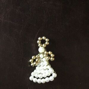 Beautiful little handmade bead angel brooch